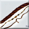 J116. Two leather chokers. - $12 